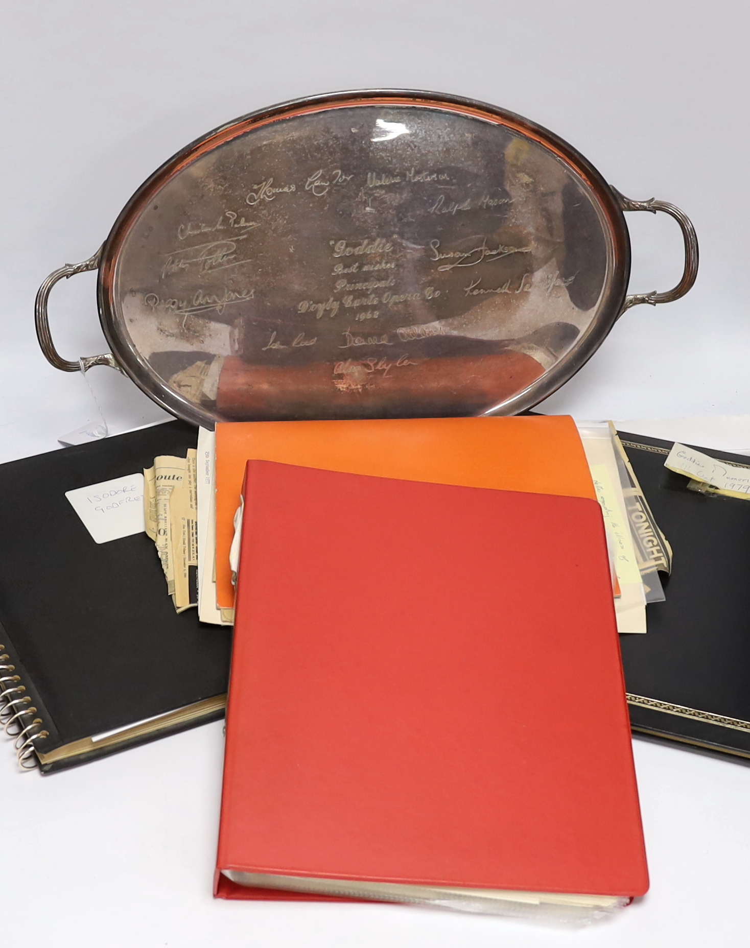 D’Oyly Carte interest; a silver plated tray with etched signatures of singers and principal artists of the D’Oyly Carte Opera Company, presented to Musical Director Isidore Godfrey on his retirement in 1968, together wit